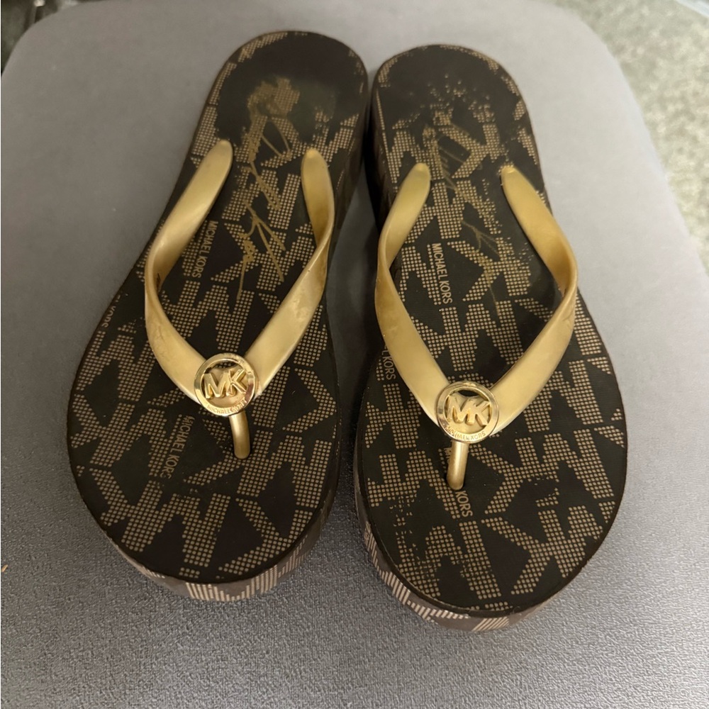 Michael Kors Black and Gold Logo Flip Flops